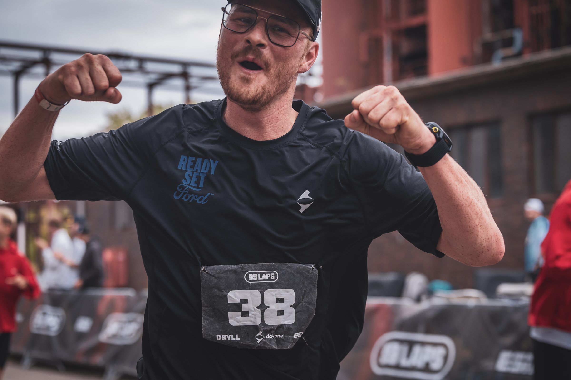 Pierre flexing on the course, bib 38